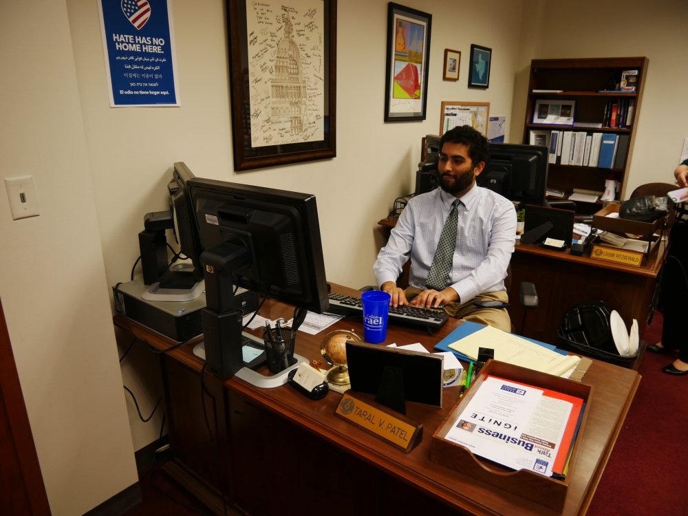 Taral Patel, legislative aide, doing some work - Photo by John Hernandez